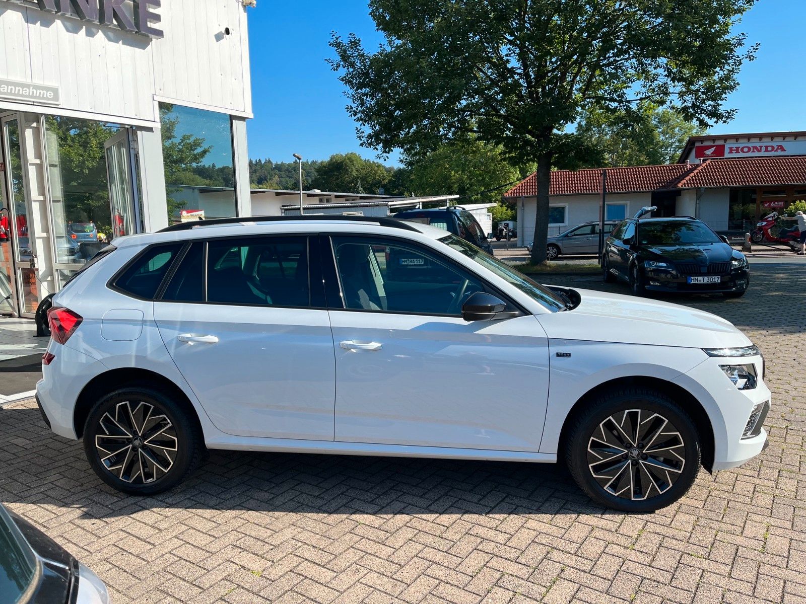Fahrzeugabbildung SKODA Kamiq Tour +NAVI/Kamera/Winter+